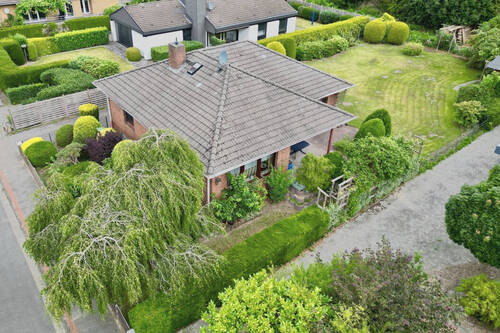 Luftaufnahme Seitenansicht - Einfamilienhaus mit 106,00 m² in Loxstedt zum Kaufen