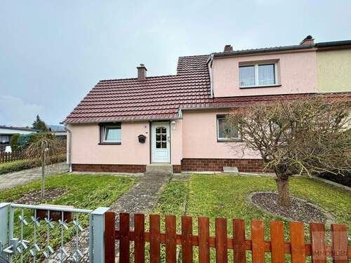 Außenansicht - Einladend & liebenswert: Doppelhaushälfte mit Gartenidylle