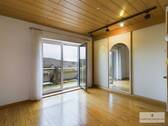 Schlafzimmer mit Balkon im OG - 