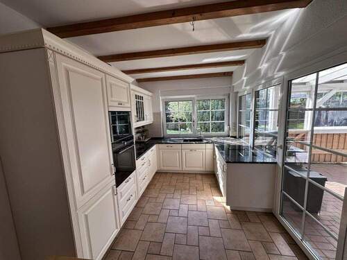 Küche mit Terrassenzugang - 