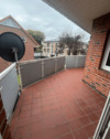 Balkon mit Ziegelwand - 