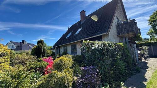 Ansicht - Ruhig gelegene 2,5-Zimmer-Wohnung mit Gartenanteil & Garage im schönen Appen