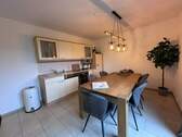 Erdgeschosswohnung - Küchen- und Essbereich mit Terrassenzugang - 