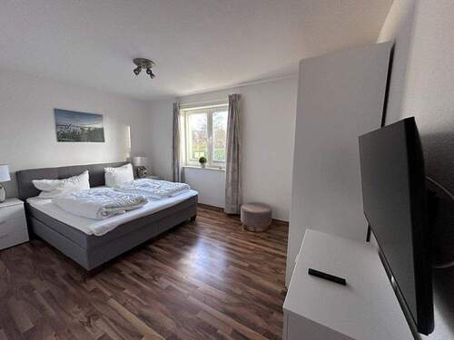 Erdgeschosswohnung - Schlafzimmer II - 