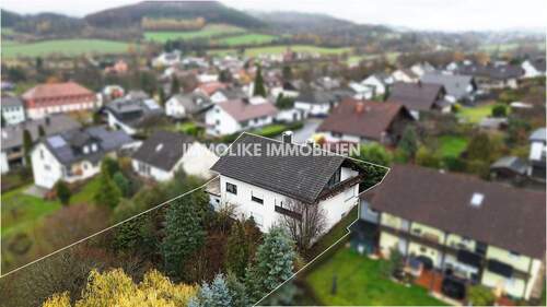 Gartenseite - 7 Zimmer Mehrfamilienhaus, Wohnhaus zum Kaufen in Sannerz