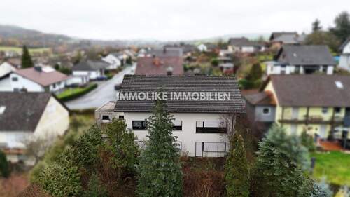 Gartenseite - 7 Zimmer Mehrfamilienhaus, Wohnhaus in Sannerz