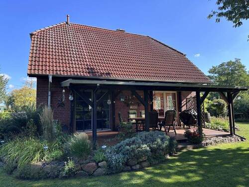 Ansicht Süd-West - Einfamilienhaus mit idyllischem Grundstück und umfangreichem Nebengelass