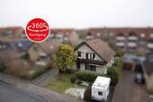 Luftbild Front - Zweifamilienhaus mit Mietpotenzial - Ideale Finanzierungsmöglichkeit durch Mieteinnahmen