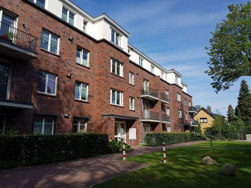 Frontansicht - Moderne Wohnung mit Tiefgaragenstellplatz und Blick in den Park