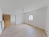 Ansicht I: Wohn- und Esszimmer - Großzügig geschnittene 3-Zimmer-Wohnung mit Wohnküche im idyllischen Kirn