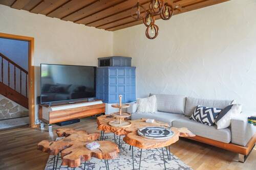 Wohnzimmer EG + Kachelofen - Einfamilienhaus mit 205,00 m&sup2; in Salem zum Kaufen