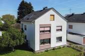 Ansicht - Pelletheizung & Dämmung: Zweifamilienhaus mit ausgebautem DG & Doppelgarage in Besenkamp