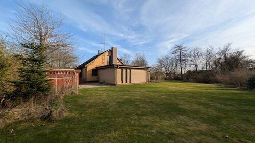 Seitliche Ansicht mit Garten - Einfamilienhaus mit 115,00 m&sup2; in Steinbergkirche zum Kaufen