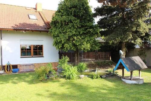 Gartenansicht - Neuer Preis! EFH, 3 km vom Zwenkauer See mit EBK, Balkon, Keller, Carport und Gartenhaus...