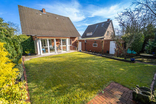 Rückansicht mit Garten - Einfamilienhaus mit 116,00 m² in Meppen zum Kaufen