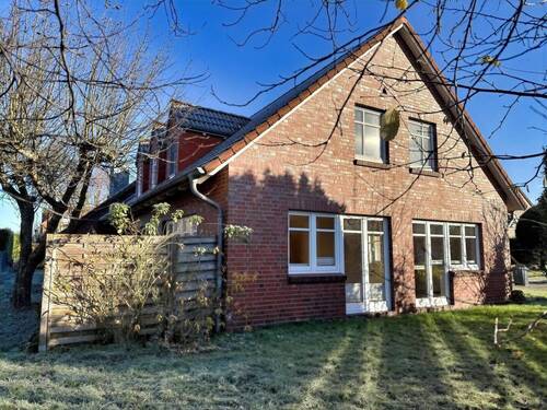 Seitenansicht - 7 Zimmer Einfamilienhaus zum Kaufen in Scheeßel