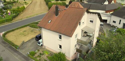 3. Luftaufnahme Balkon.jpg - 1 Zimmer Mehrfamilienhaus, Wohnhaus in Sand a.Main