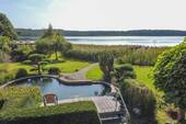 Ausblick und Koi-Teich - 4 Zimmer Reihenendhaus in Krakow am See