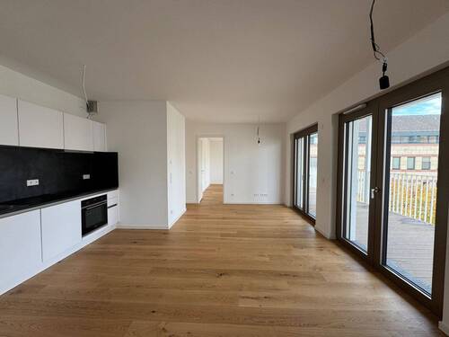 Offene Küche mit Wohnbereich.jpg - Etagenwohnung mit 100,00 m² in Frankfurt am Main zur Miete