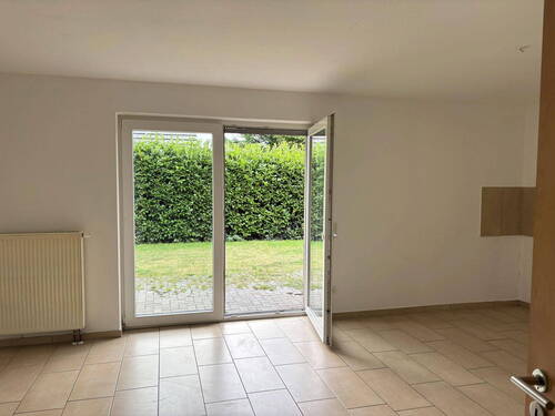 Wohnbereich/Küche - Helle 2-Zimmer-EG-Wohnung mit Terrasse in Ochtrup - Nur mit Wohnberechtigungsschein (WBS)!