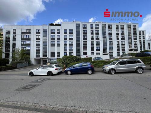 Titelbild - Gepflegte und teilmöblierte 3-Zimmer-Eigentumswohnung mit Balkon, Aufzug & Garage in Aachen-Haaren