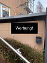 Werbeschild vor Hauseingang - 
