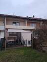 Garten mit Sonnensegel - Reihenmittelhaus mit 146,00 m² in Kirchheim unter Teck zum Kaufen
