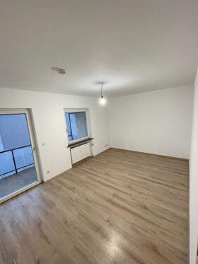 Wohnzimmer - 2 Zimmer Etagenwohnung in Bruchköbel