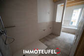 Bad mit Dusche und Wanne - 