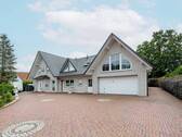 Vorderansicht - 294?m² Wohnluxus auf 1.500?m² Traumgrund - Exklusives Einfamilienhaus in Bestlage von Lemförde