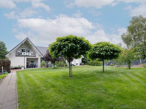 Ansicht Garten - Einfamilienhaus mit 293,70 m² in Lemförde zum Kaufen