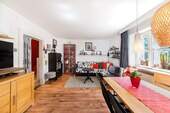 Wohnzimmer im EG - 6 Zimmer Einfamilienhaus zum Kaufen in München