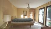 Schlafzimmer mit Zugang Garten und Terrasse - 