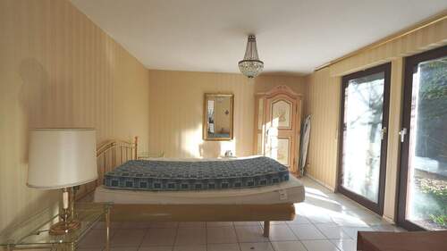Schlafzimmer mit Zugang Garten und Terrasse - 