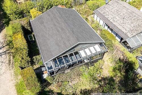 mit Garten und Veranda - 