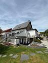 Rückansicht - Bezugsfertiges Einfamilienhaus mit großem Blk, Garage, 2 Bädern und sonnigem Grundstück