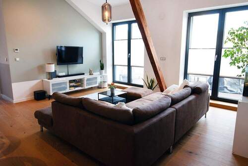 Wohnzimmer-Blick auf Terrasse - Etagenwohnung mit 126,00 m² in Pfungstadt zum Kaufen