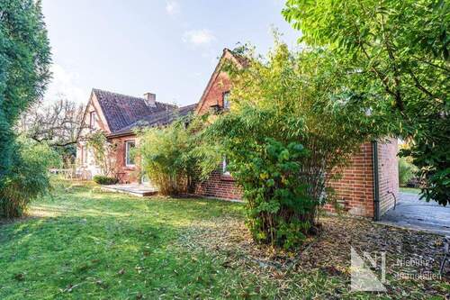 Zwei Sonnenterrassen mit Gartenblick - 