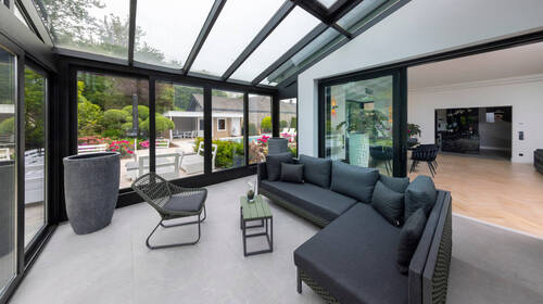 Wintergarten mit Blick ins Wohnzimmer - 