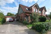 Bild 2 - 9 Zimmer Mehrfamilienhaus, Wohnhaus zum Kaufen in Tremsbüttel