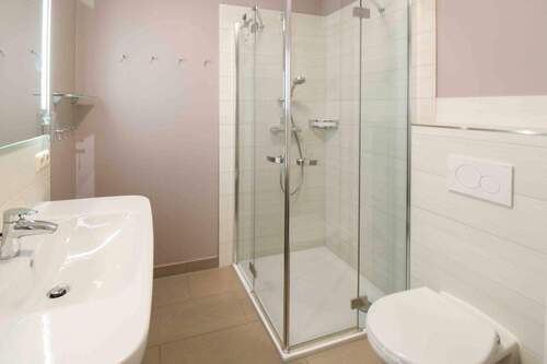 Badezimmer - Etagenwohnung mit 55,10 m² in Sellin zum Kaufen