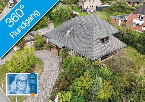 Winkelbungalow mit halbrunder Auffahrt - 