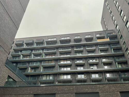 Gebäude - Praktische 1-Zimmer-Wohnung mit Balkon und Einbauküche gesucht?