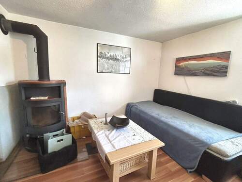 Obergeschoss: Zimmer mit Schwedenofen - 