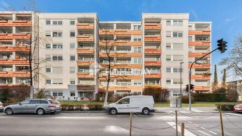 Außenansicht 5 - Erdgeschosswohnung mit durchdachter Raumaufteilung, Balkon und Gartenanteil