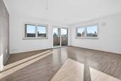 Wohnzimmer - Bezugsfrei! Neuwertige Wohnung in Bach mit viel Komfort
