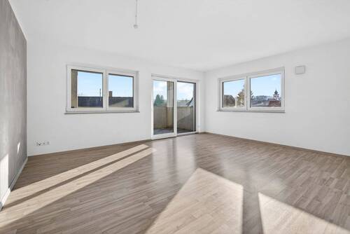 Wohnzimmer - Bezugsfrei! Neuwertige Wohnung in Bach mit viel Komfort