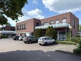 Ansicht Straßenseite - Mehrfamilienhaus, Wohnhaus zum Kaufen in Stuhr