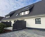 Außenansicht - Sonnige Terrasse: Umfassend modernisierte Doppelhaushälfte