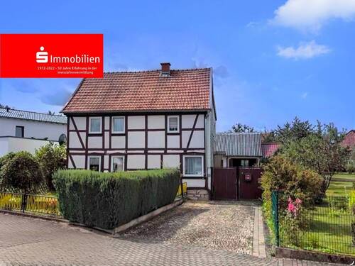 Strassenansicht - Wohnen am Ohmberg mit viel Platz und Potential!